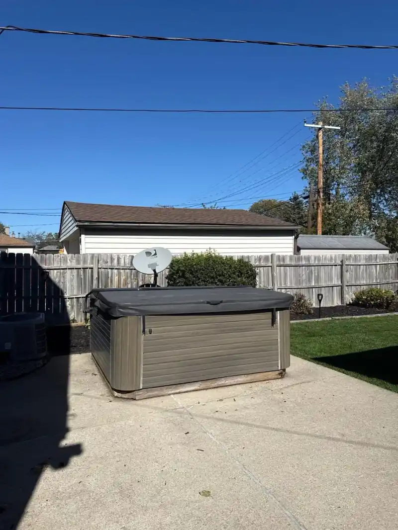 Hot tub in a Garden City backyard before removal