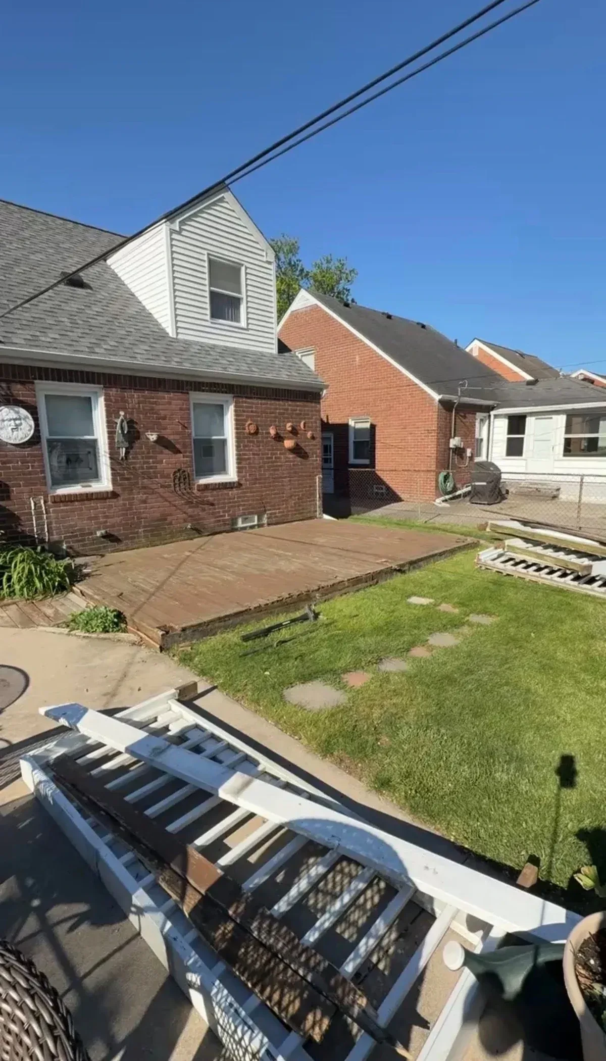 Wood deck boards before selective removal in Grosse Pointe Woods, Michigan