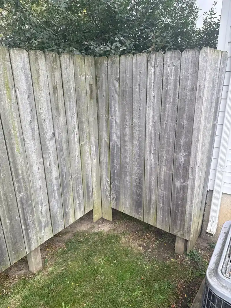 Fence post hole and soil after extraction of a concrete-set post